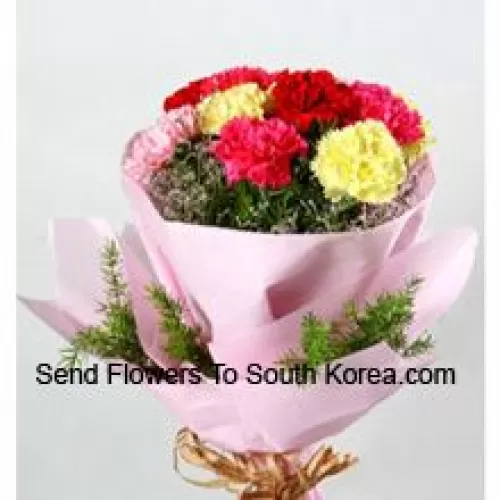 Bouquet de 12 œillets de couleurs mélangées avec des garnitures saisonnières
