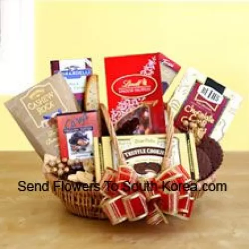Satisfy her sweet tooth this year with a gift dedicated to chocolate indulgence! Our wicker basket comes brimming with a vast array of gourmet treats, all celebrating the many reasons to love chocolate. Its sweet excess includes Beth's chocolate chip cookies, English toffee, Chocolate truffle cookies, biscotti, Lindt truffles, Cashew Roca and a Ghirardelli chocolate bar. (Please Note That We Reserve The Right To Substitute Any Product With A Suitable Product Of Equal Value In Case Of Non-Availability Of A Certain Product)
